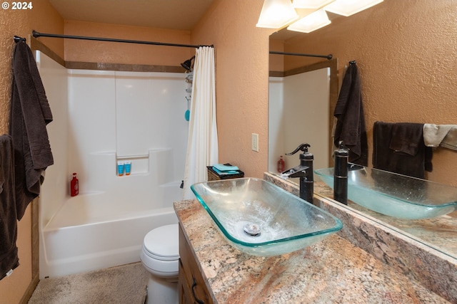 full bathroom with shower / bath combo with shower curtain, vanity, and toilet