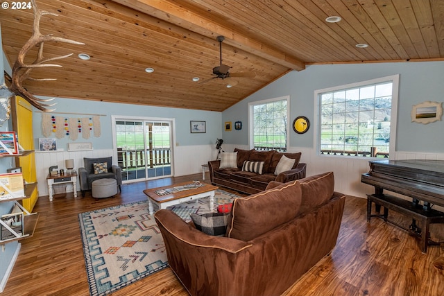 living room with ceiling fan, hardwood / wood-style flooring, plenty of natural light, and wooden ceiling