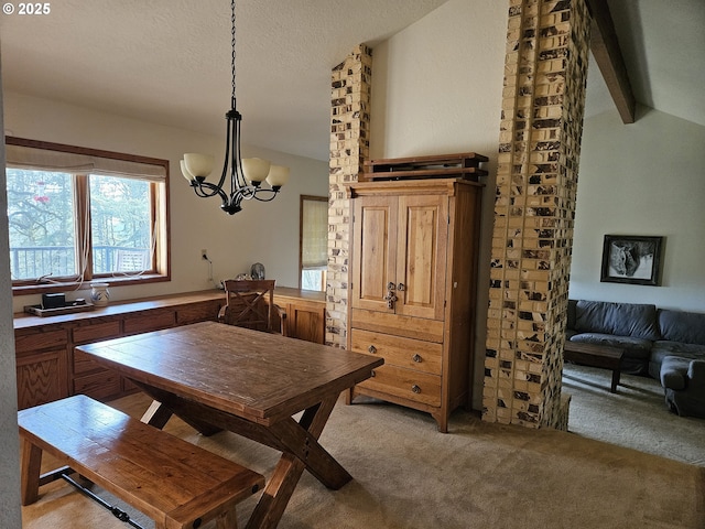 1550 NW Emperor Dr, Corvallis, OR 97330 - dining area with light colored carpet, a textured ceiling, a notable chandelier, and vaulted ceiling with beams