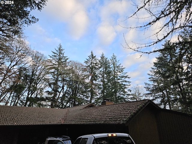 1550 NW Emperor Dr, Corvallis, OR 97330 - exterior details featuring a chimney and a tile roof