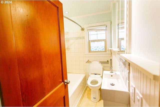 full bathroom with tile patterned flooring, bathtub / shower combination, toilet, and crown molding