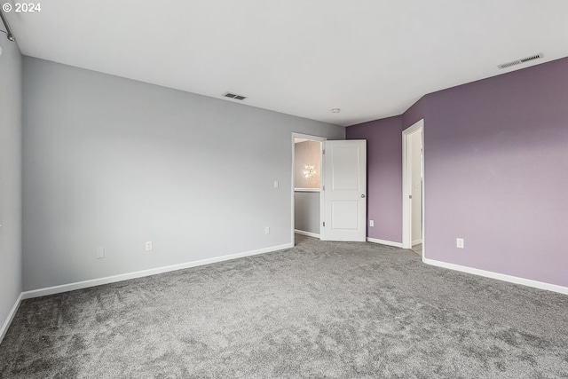 unfurnished room with carpet floors