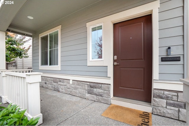 entrance to property with a porch