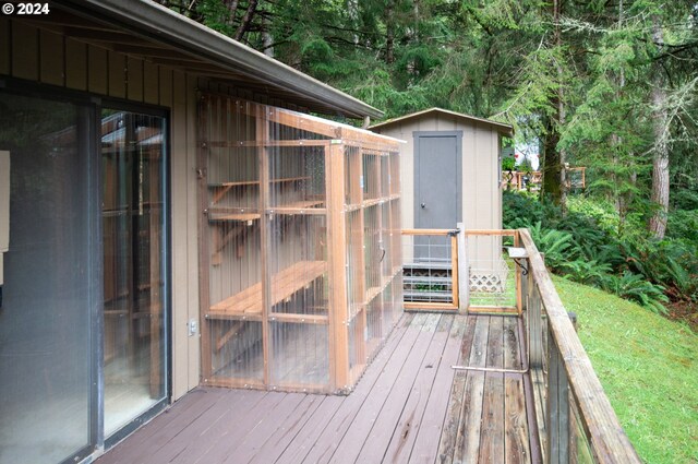 wooden deck with a shed