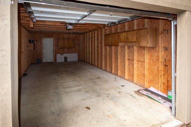 garage with wood walls