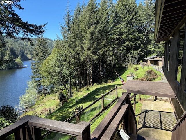 2822 S Tenmile Lk, Lakeside, OR 97449 - balcony featuring a view of trees and a water view