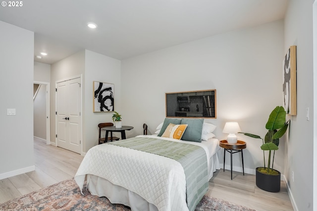 13185 SW Carmel St, Tigard, OR 97224 - bedroom featuring light wood-style flooring, baseboards, recessed lighting, and a closet