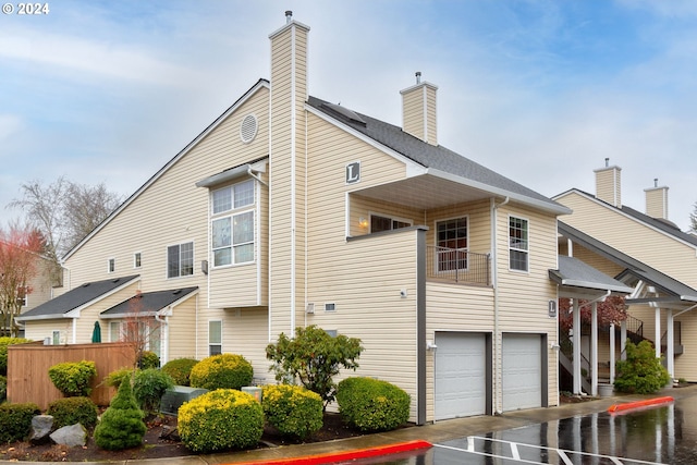 view of property exterior with a garage