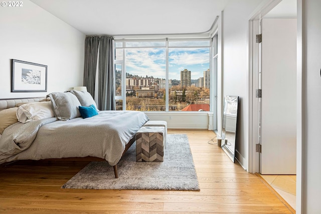 bedroom featuring light wood-type flooring