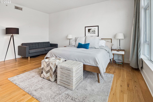 bedroom with light wood-type flooring