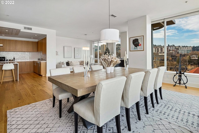 dining area featuring light hardwood / wood-style floors