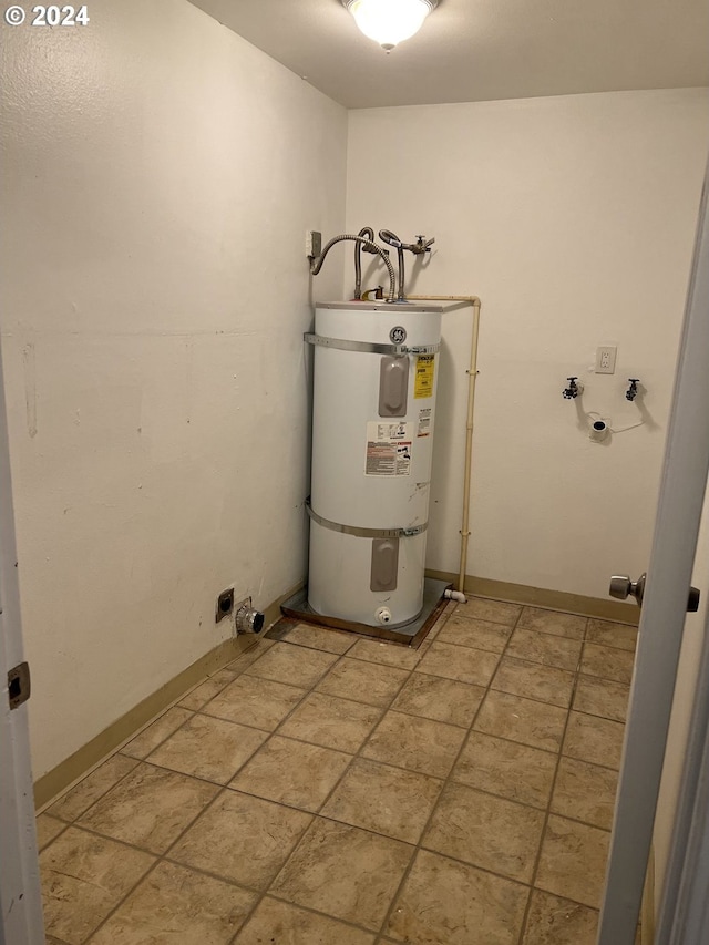 utility room featuring strapped water heater