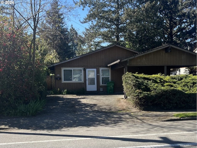 view of front of house with a carport