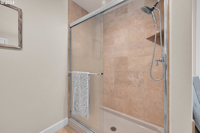 bathroom with an enclosed shower