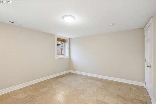 view of tiled spare room