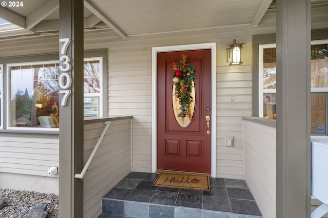 property entrance with a porch