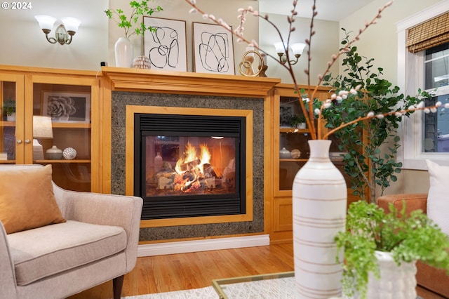 living area with hardwood / wood-style floors