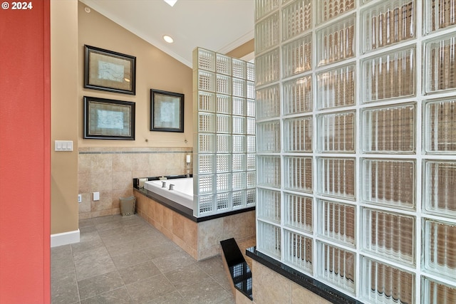 full bathroom with tile patterned flooring, ornamental molding, a bath, and lofted ceiling