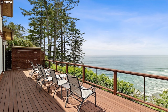 wooden terrace with a water view