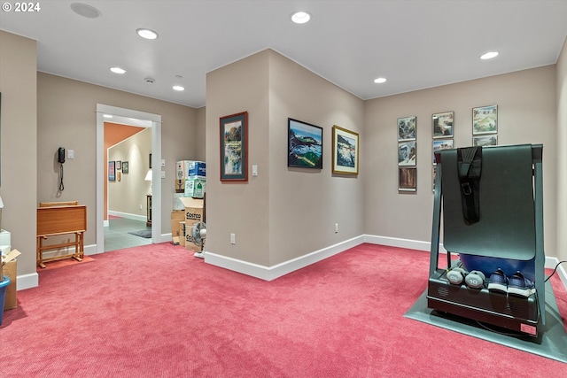 workout area featuring recessed lighting, baseboards, and carpet