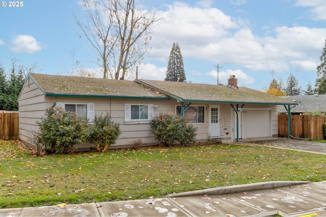 single story home with a front lawn and a garage