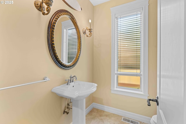 bathroom featuring tile patterned flooring