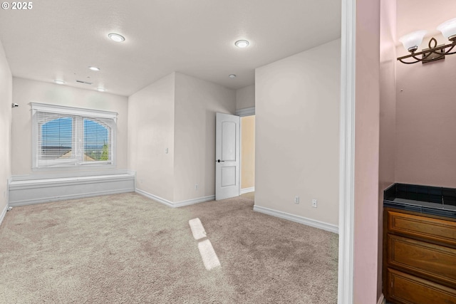 bedroom with light colored carpet