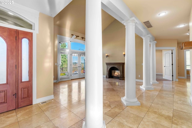 tiled entrance foyer featuring french doors