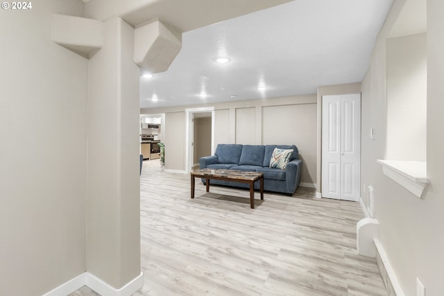 living room with light hardwood / wood-style floors