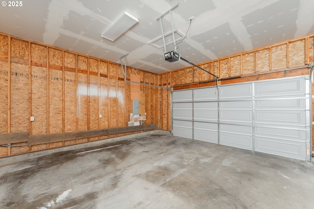 garage featuring electric panel and a garage door opener