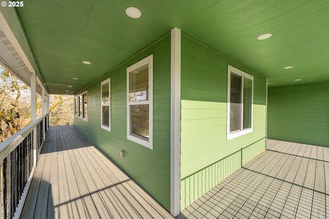 wooden terrace featuring a porch