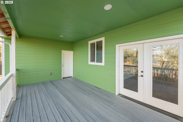 wooden deck featuring french doors