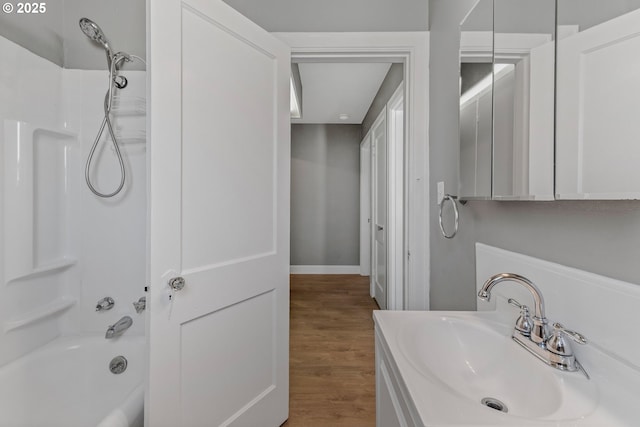 2849 Florida St, Longview, WA 98632 - bathroom with wood finished floors, shower / washtub combination, and vanity