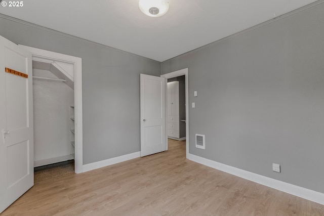 2849 Florida St, Longview, WA 98632 - unfurnished bedroom featuring light wood-type flooring and a closet