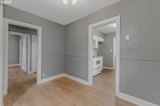 2849 Florida St, Longview, WA 98632 - unfurnished dining area featuring baseboards and light wood-style flooring