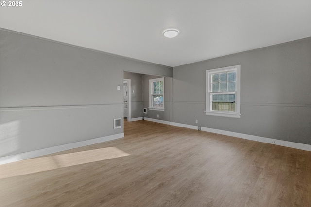 2849 Florida St, Longview, WA 98632 - spare room with wood finished floors and baseboards
