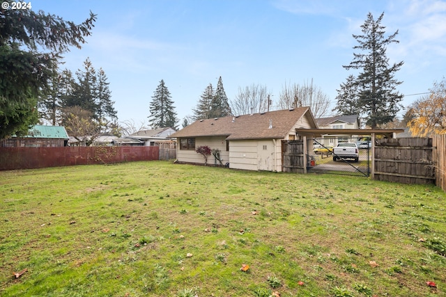 view of yard with a carport