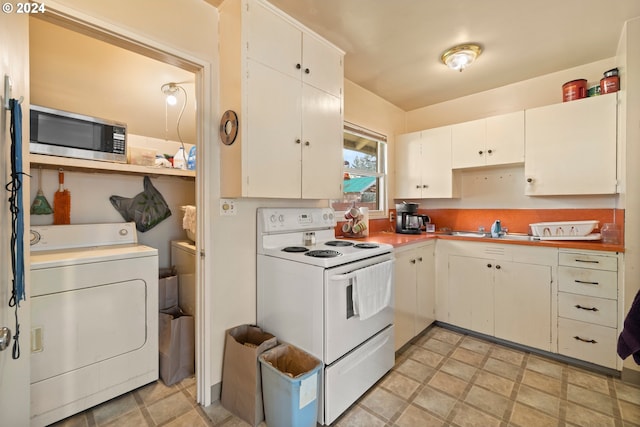 kitchen with washer and clothes dryer, sink, white electric range, white cabinetry, and stainless steel microwave