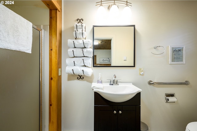 kitchen featuring sink, white appliances, and light brown cabinets