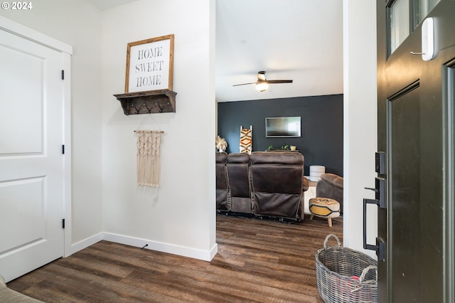 corridor with dark hardwood / wood-style floors