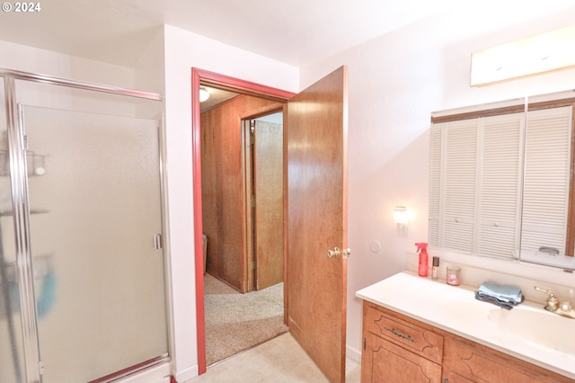 full bath featuring a shower stall and vanity