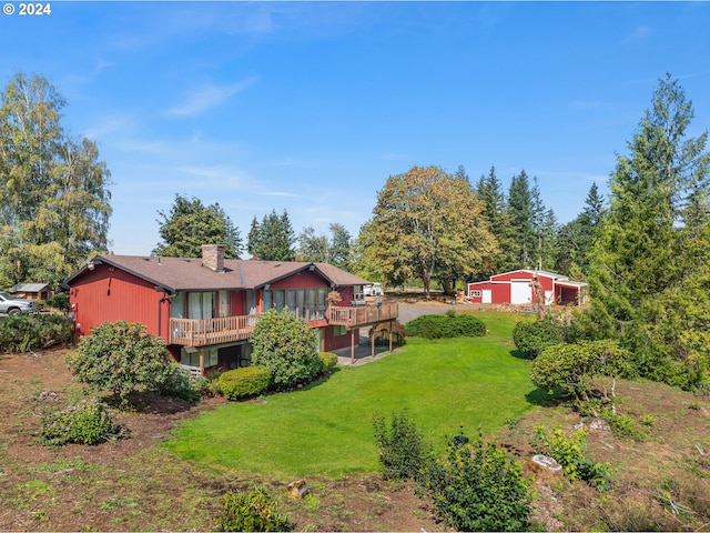 view of yard with a wooden deck