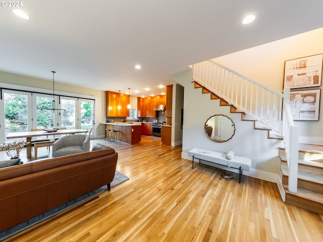 living room featuring light wood-type flooring