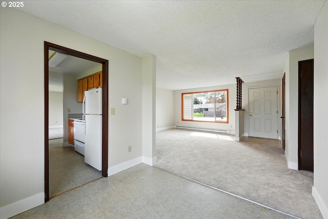 20125 SW Rachelle Ct, Beaverton, OR 97078 - unfurnished room with a baseboard heating unit, baseboards, a textured ceiling, and light flooring
