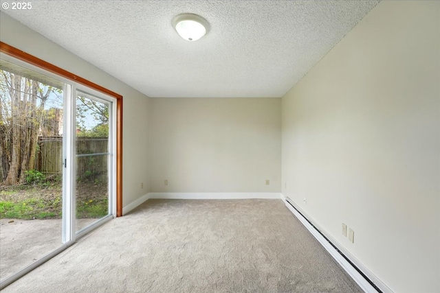 20125 SW Rachelle Ct, Beaverton, OR 97078 - empty room with a baseboard heating unit, carpet floors, a textured ceiling, and baseboards