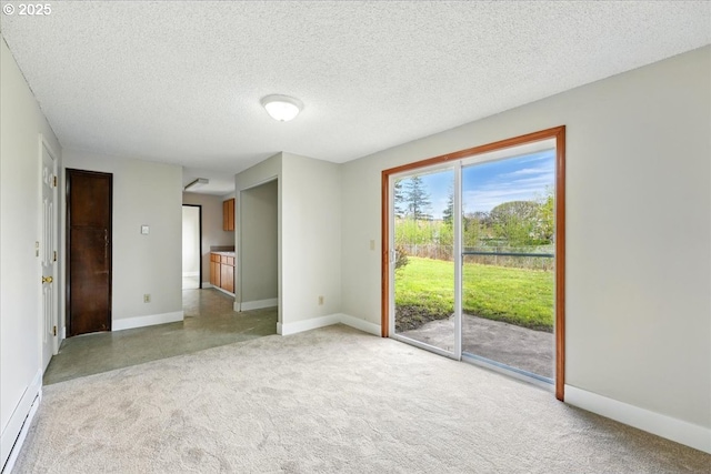 20125 SW Rachelle Ct, Beaverton, OR 97078 - empty room with light colored carpet, a textured ceiling, and baseboards