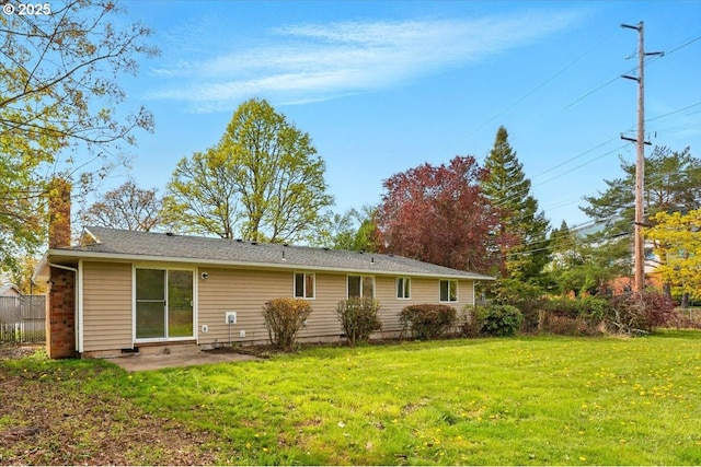 20125 SW Rachelle Ct, Beaverton, OR 97078 - back of property with a chimney, a lawn, and a patio