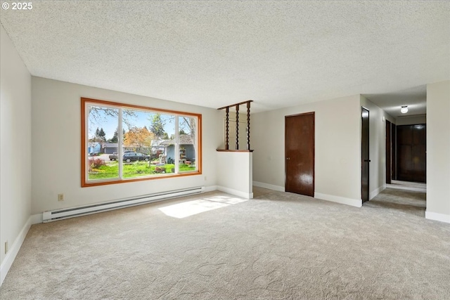 20125 SW Rachelle Ct, Beaverton, OR 97078 - unfurnished living room with a baseboard heating unit, carpet flooring, a textured ceiling, and baseboards