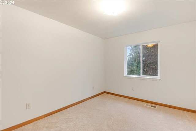 empty room with carpet floors