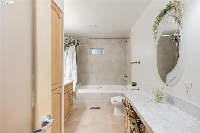 full bathroom featuring toilet, tile patterned flooring, shower / bathtub combination with curtain, and vanity